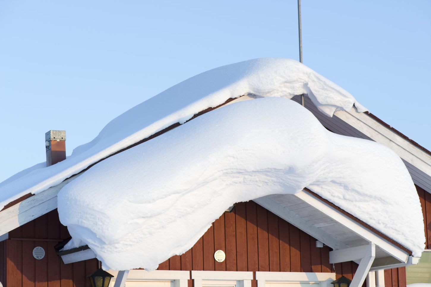 A home covered with snow
