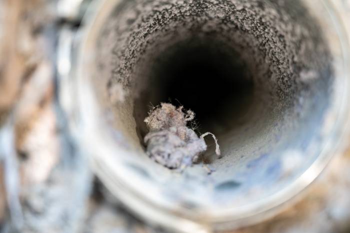 Dust particles stuck in an air duct